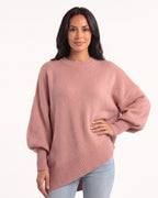 Women's oversized batwing crewneck sweater, blush pink knit with ribbed cuffs and hem