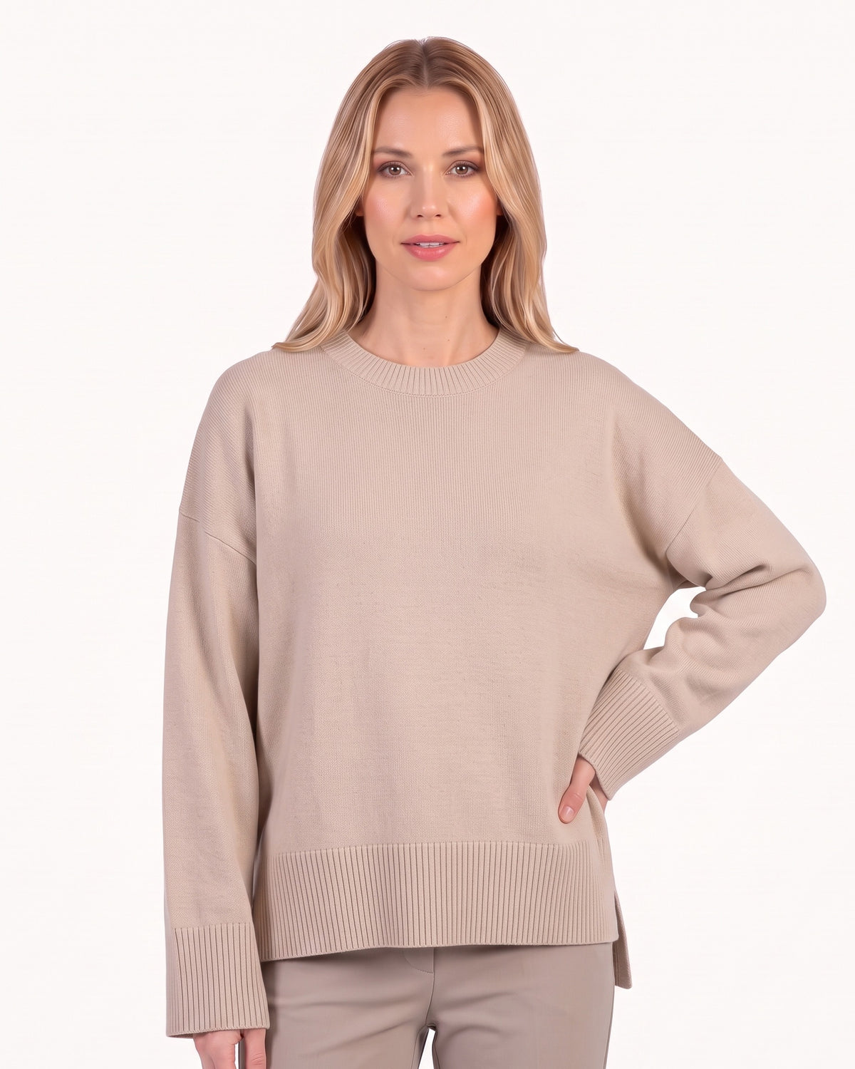 Beige oversized crew neck knit sweater with ribbed cuffs and ribbed hem