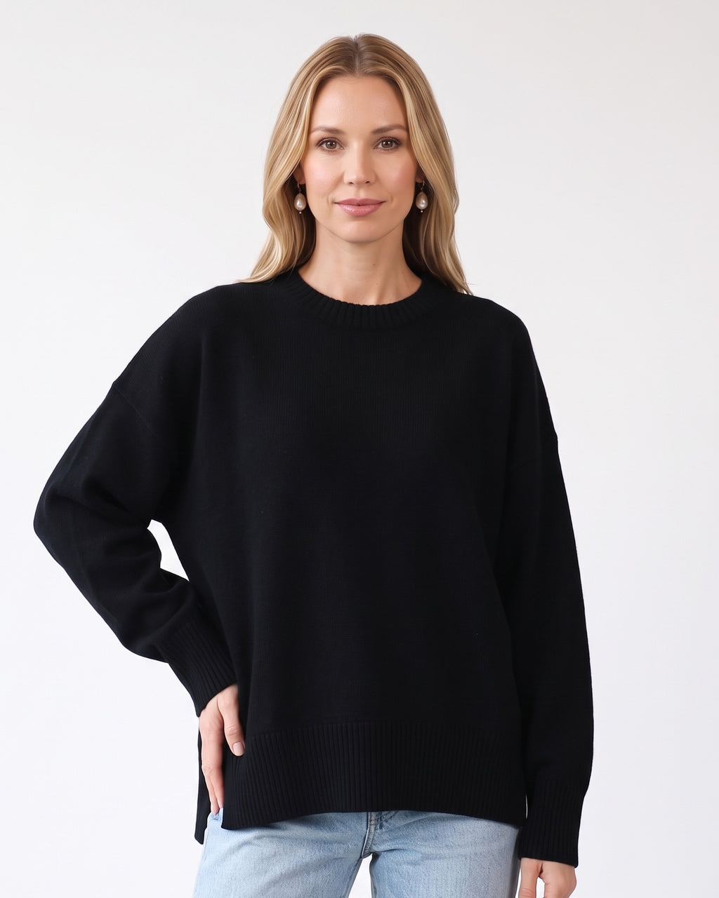 Black oversized crew neck knit sweater with ribbed cuffs and ribbed hem