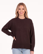 Dark brown oversized crew neck knit sweater with ribbed cuffs and ribbed hem