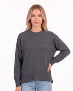 Dark gray oversized crew neck knit sweater with ribbed cuffs and ribbed hem