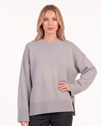 Women's oversized crew neck sweater, gray knit with high-low hem and side slits
