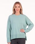Mint green oversized crew neck knit sweater with ribbed cuffs and straight hem