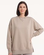 Women's oversized crewneck sweatshirt, beige, exposed seams and side slits