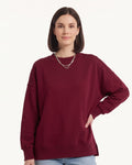 Women's oversized crewneck sweatshirt, burgundy, exposed seams and side slits