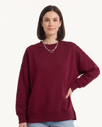Women's oversized crewneck sweatshirt, burgundy, exposed seams and side slits