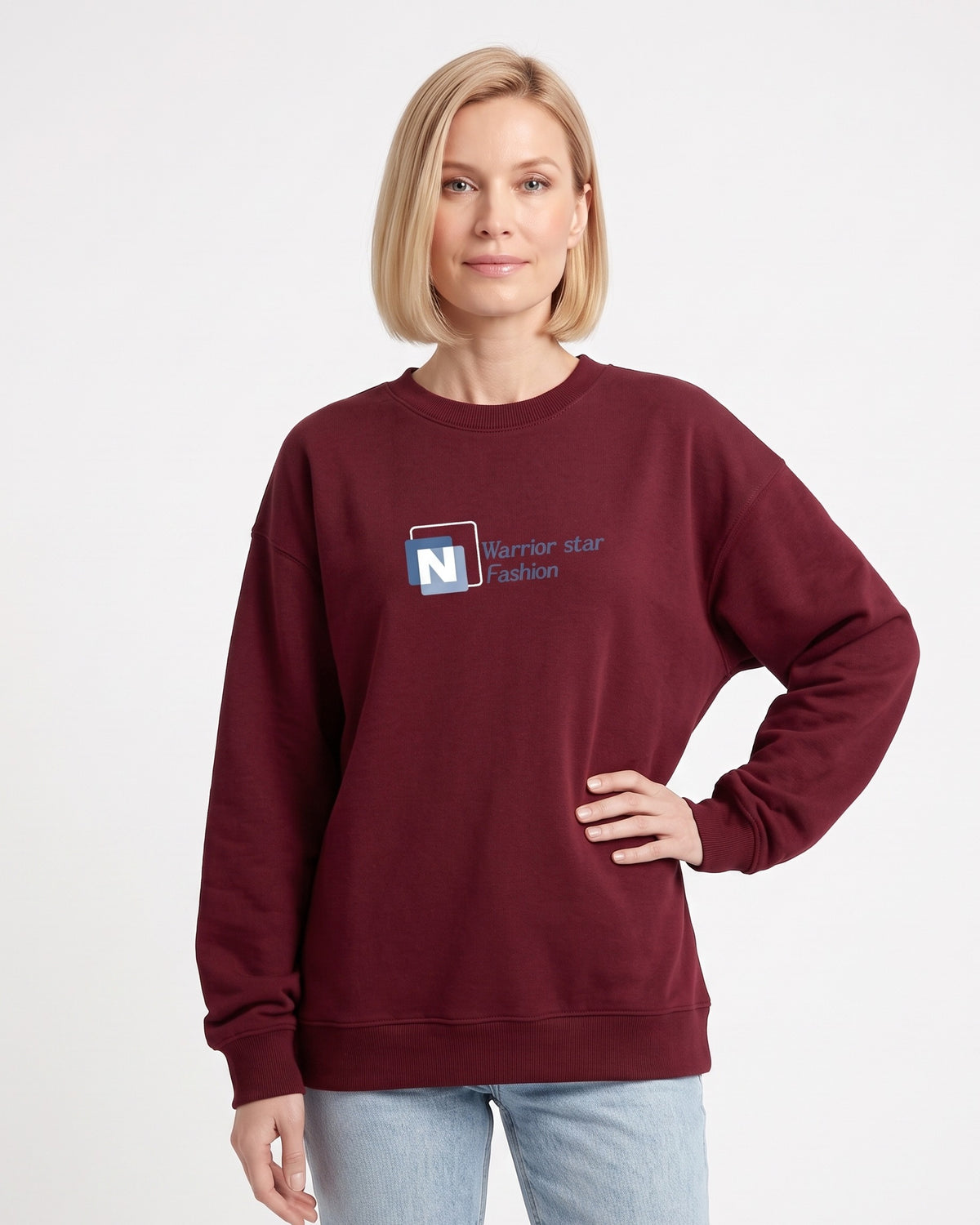 Burgundy crewneck sweatshirt with N logo graphic, long sleeves, ribbed cuffs.
