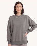 Women's oversized crewneck sweatshirt, dark gray, exposed seams and side slits