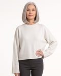 White oversized cropped crew-neck knit sweater with ribbed hem and cuffs