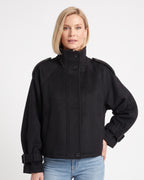 Black cropped wool jacket, funnel neck stand, button front, epaulettes, cuff tab straps.