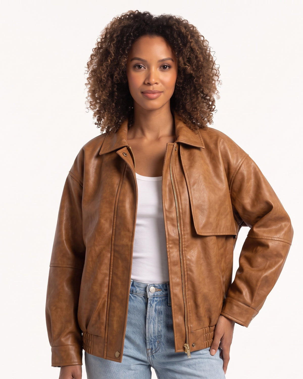 Brown faux leather jacket with snap collar and zip front, oversized shoulders