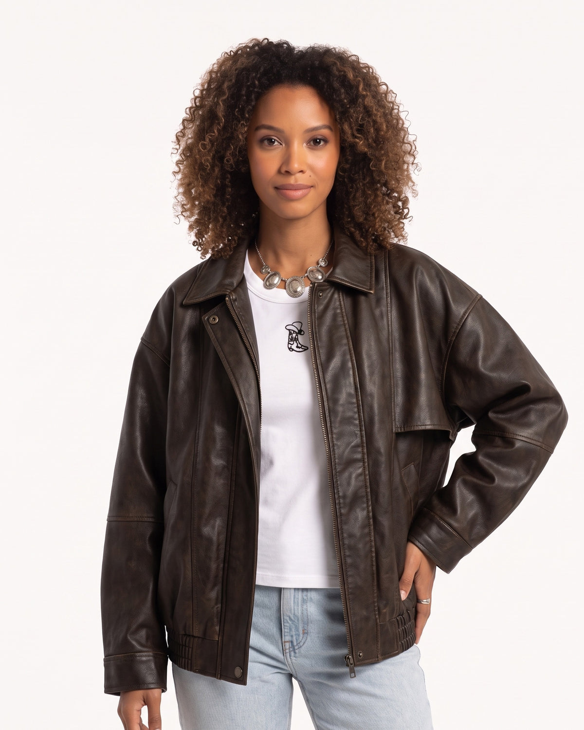 Black faux leather jacket with snap collar, zip front, and side pockets