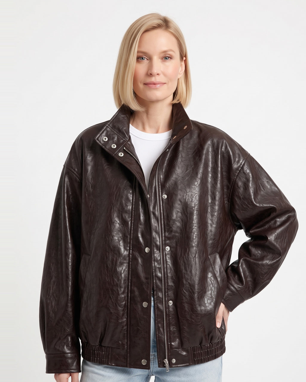 Oversized dark brown faux leather jacket, snap front with stand collar, ribbed cuffs