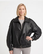 Oversized faux leather moto jacket with double collar, zip front, and waist belt