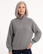 Gray ribbed half-zip sweater with funnel neck, drop shoulders, long sleeves