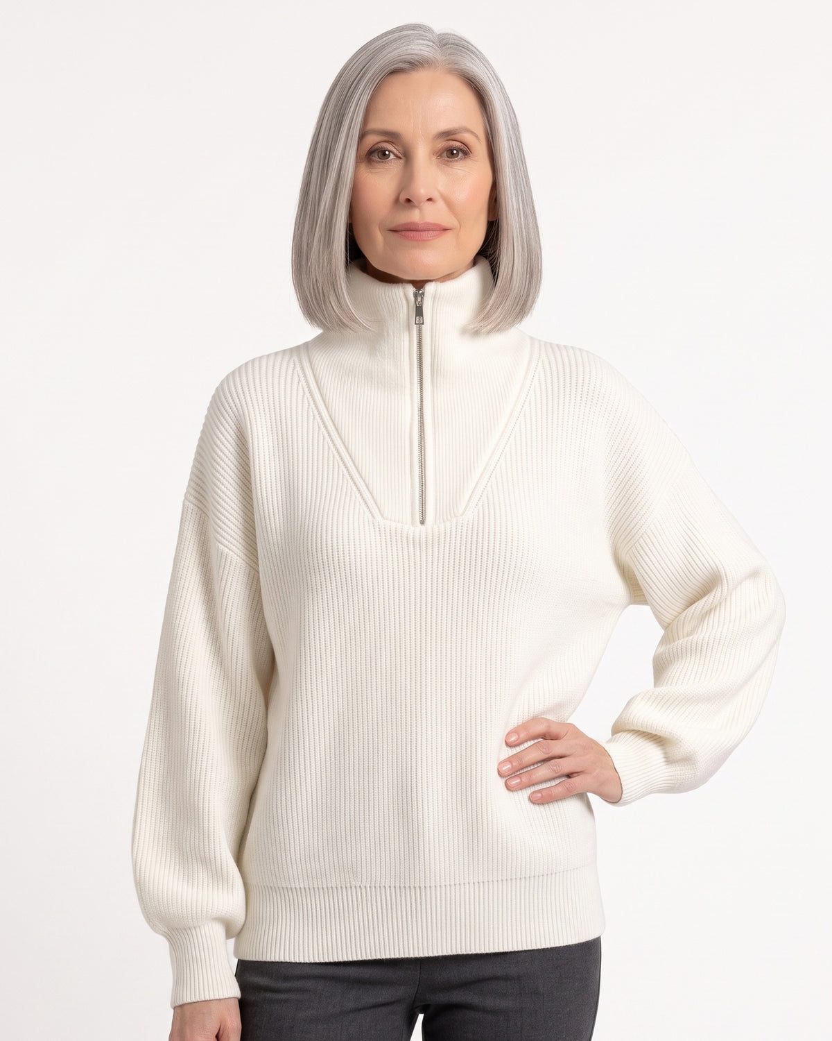 White ribbed half-zip sweater with funnel neck, drop shoulders, long sleeves