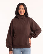 Oversized brown half-zip sweatshirt with funnel neck and kangaroo pocket