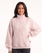 Women's oversized light pink half-zip sweatshirt with funnel neck and kangaroo pocket