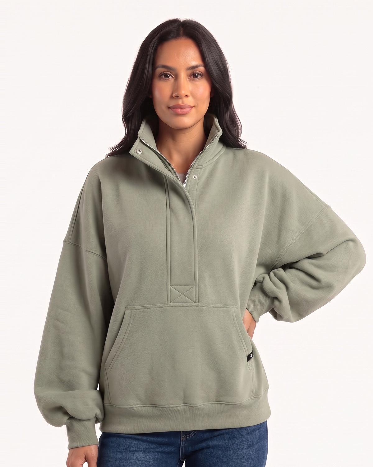 Women's oversized sage green half-zip sweatshirt with funnel neck and kangaroo pocket