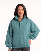 Oversized teal half-zip sweatshirt with funnel neck and kangaroo pocket