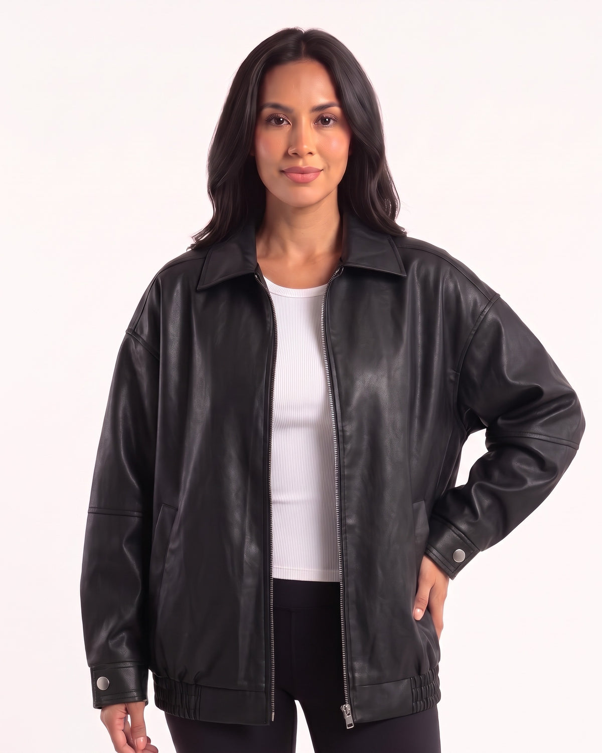Black oversized faux leather bomber jacket with collar, zip front, drop shoulders and snap cuffs
