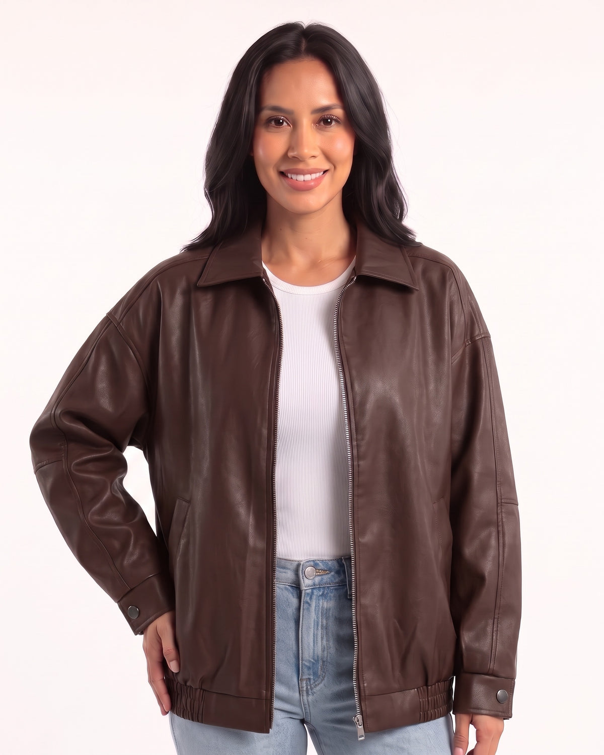 Brown oversized faux leather bomber jacket with collar, zip front, drop shoulders and snap cuffs