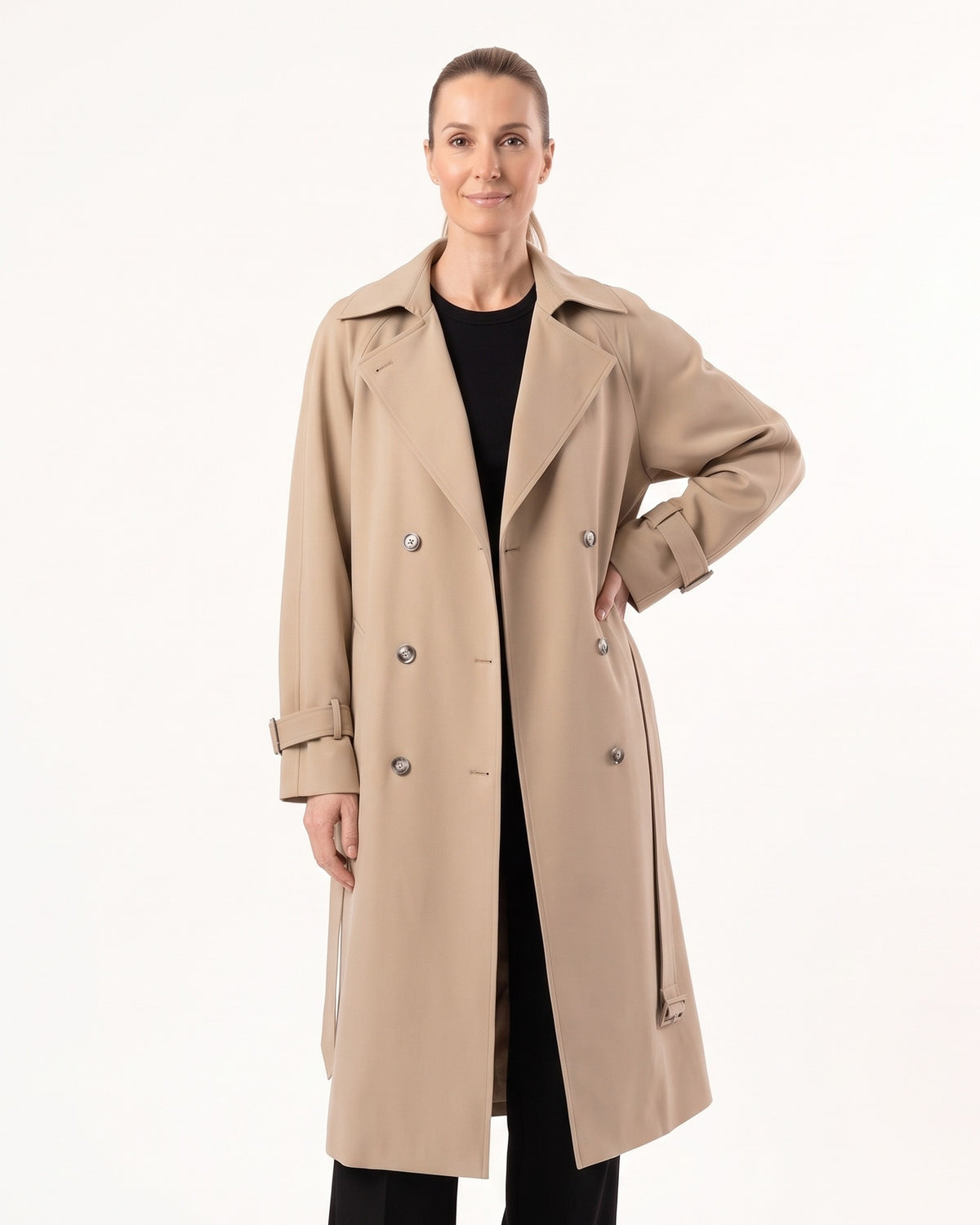Beige long double-breasted trench coat with belt and buckled cuffs, wide lapels