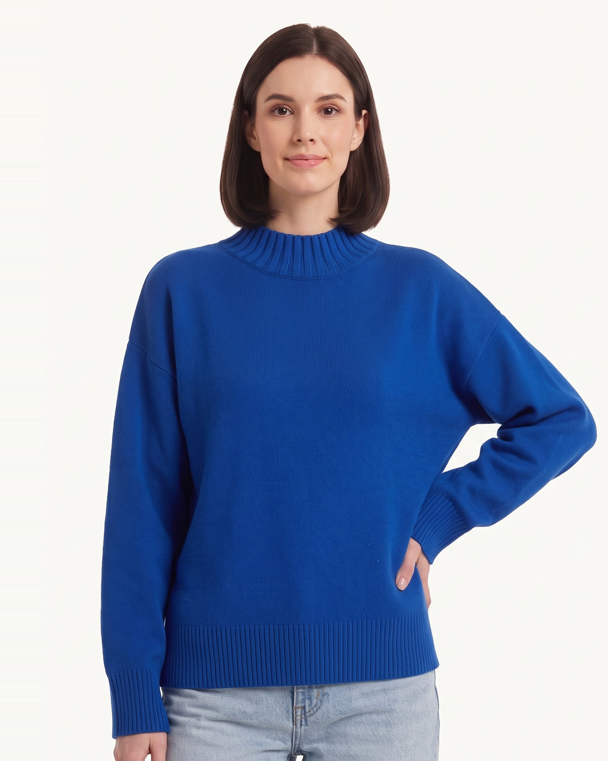 Women’s oversized mock neck sweater in blue with balloon sleeves and ribbed hem