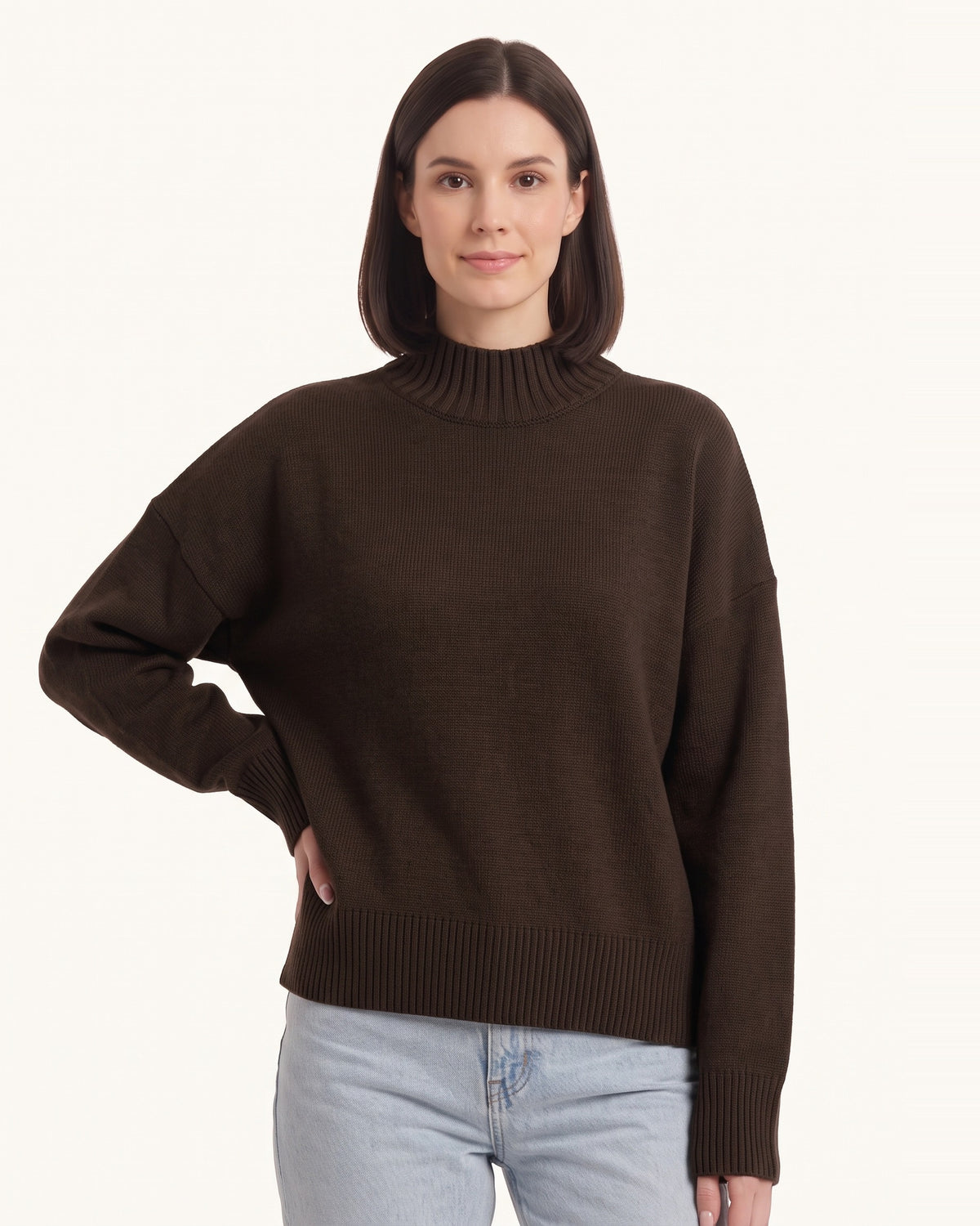 Women’s oversized mock neck sweater in dark brown with balloon sleeves and ribbed hem