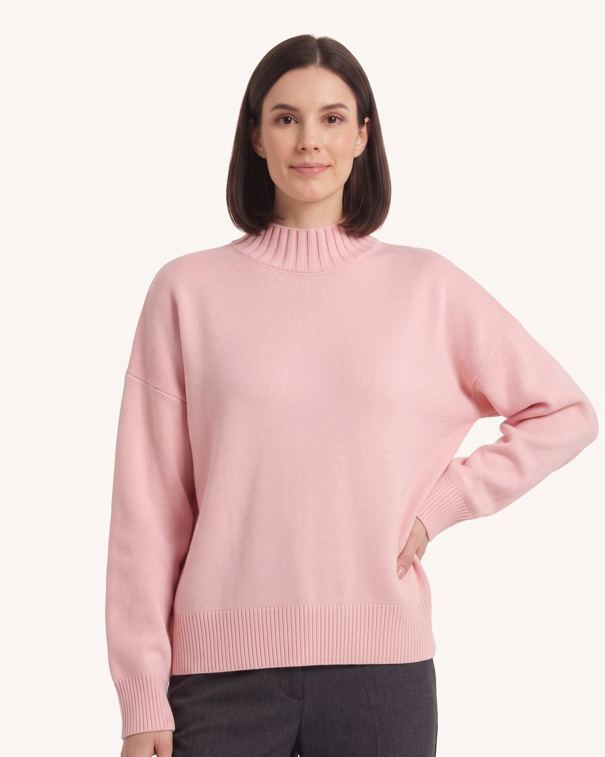 Women’s oversized mock neck sweater in pink with balloon sleeves and ribbed cuffs