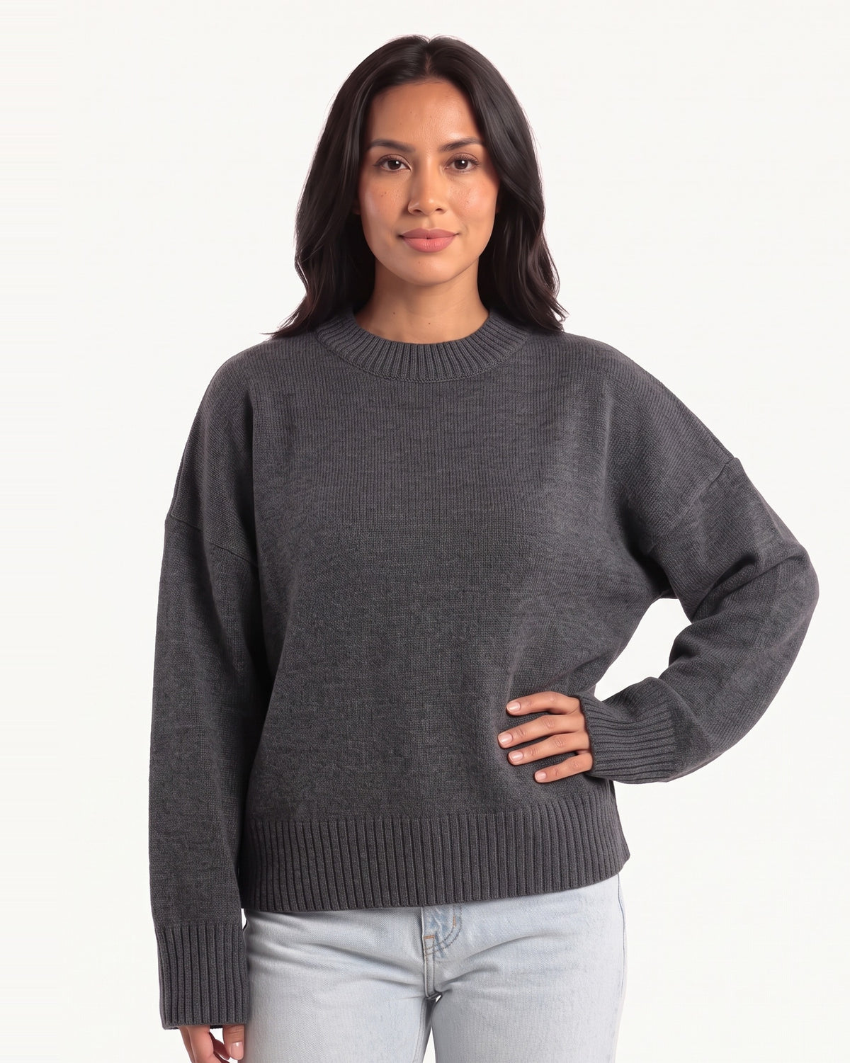 Dark gray oversized crewneck knit sweater with wide ribbed cuffs and ribbed hem