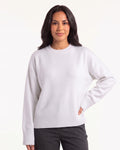 White oversized crewneck knit sweater with wide ribbed cuffs and ribbed hem