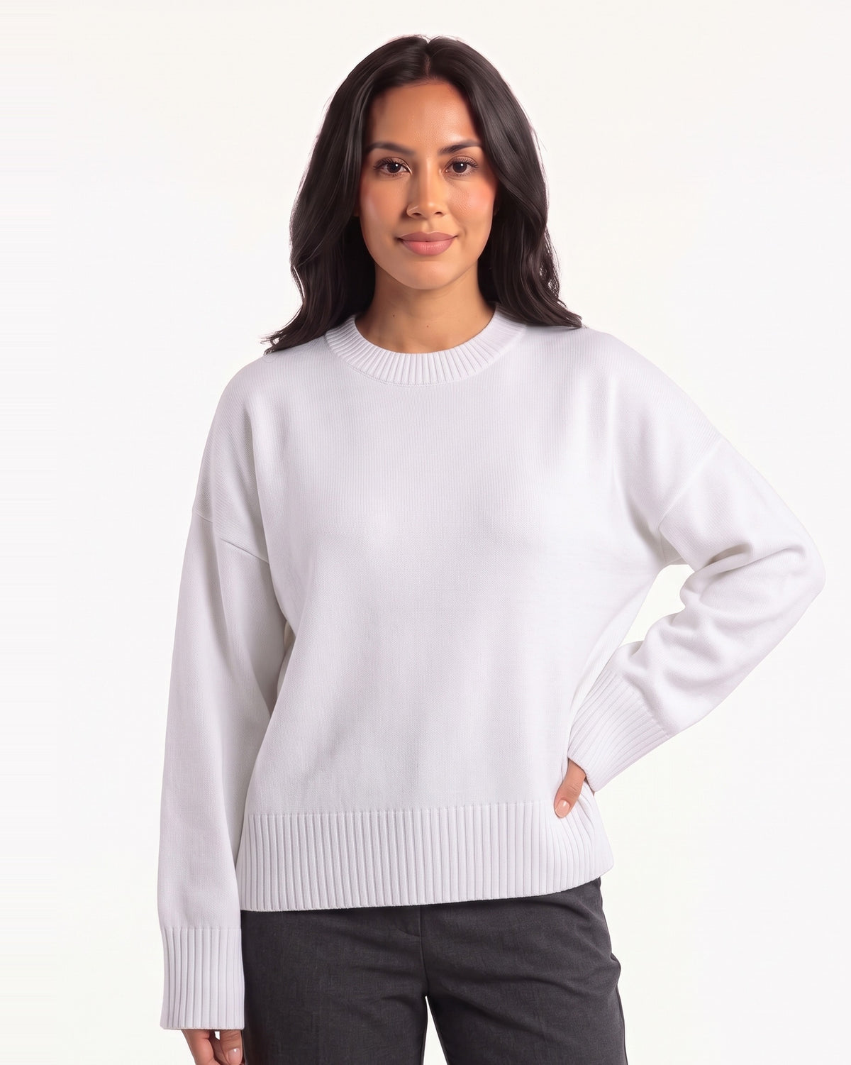 White oversized crewneck knit sweater with wide ribbed cuffs and ribbed hem