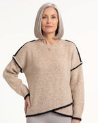Beige oversized crew neck knit sweater with contrast trim and relaxed drop shoulders