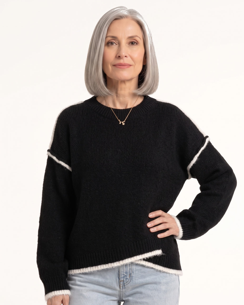 Black oversized crew neck knit pullover with contrast trim and relaxed drop-shoulder sleeves