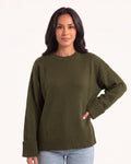 Army green oversized knit sweater with crew neck, dropped shoulders, and wide ribbed cuffs and hem