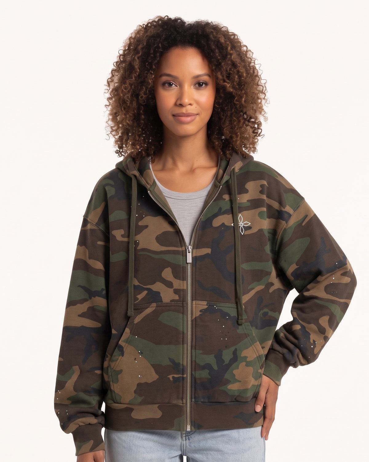 Camo zip-up hoodie with hood and kangaroo pocket, embroidered chest logo.
