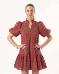Plaid mini dress with puff sleeves and tiered skirt, red base with green and navy plaid