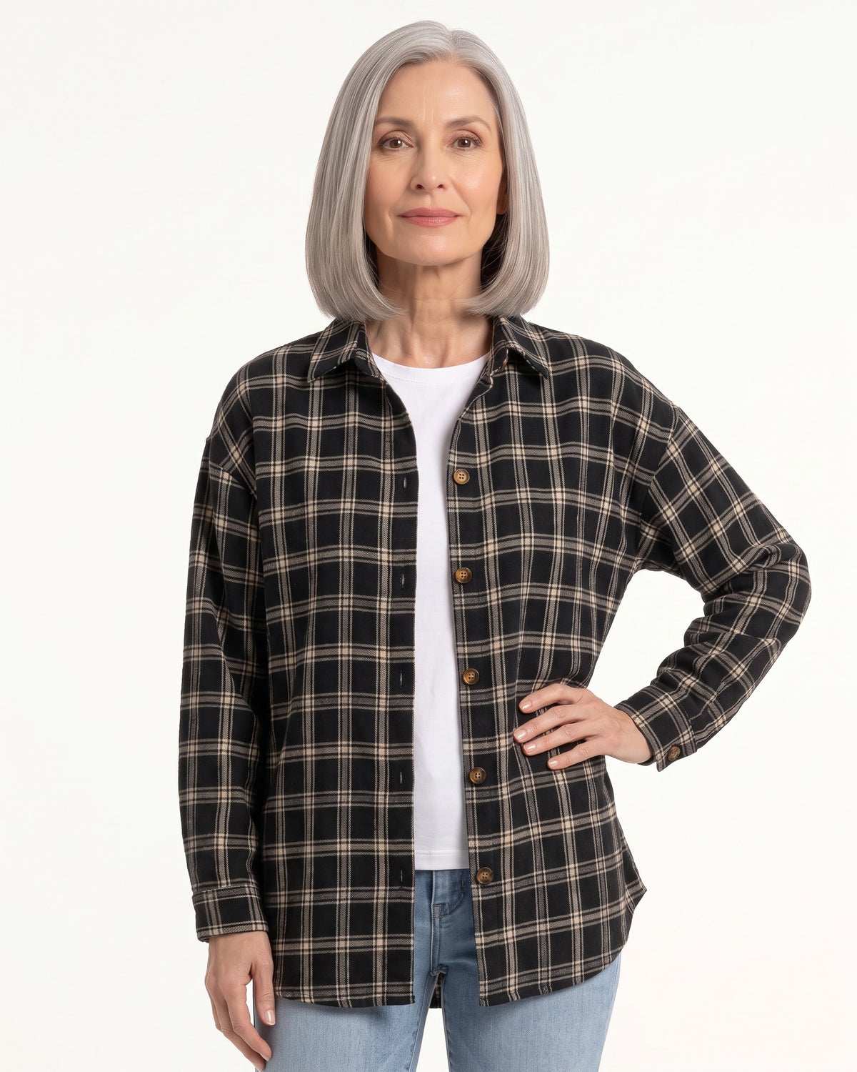 Dark plaid button-down shirt with long sleeves and chest buttons