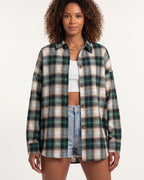Oversized women's plaid button-down shirt in green, tan and white, long sleeves, buttons
