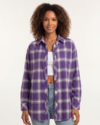 Oversized women's plaid button-down shirt in purple and white, long sleeves, button front