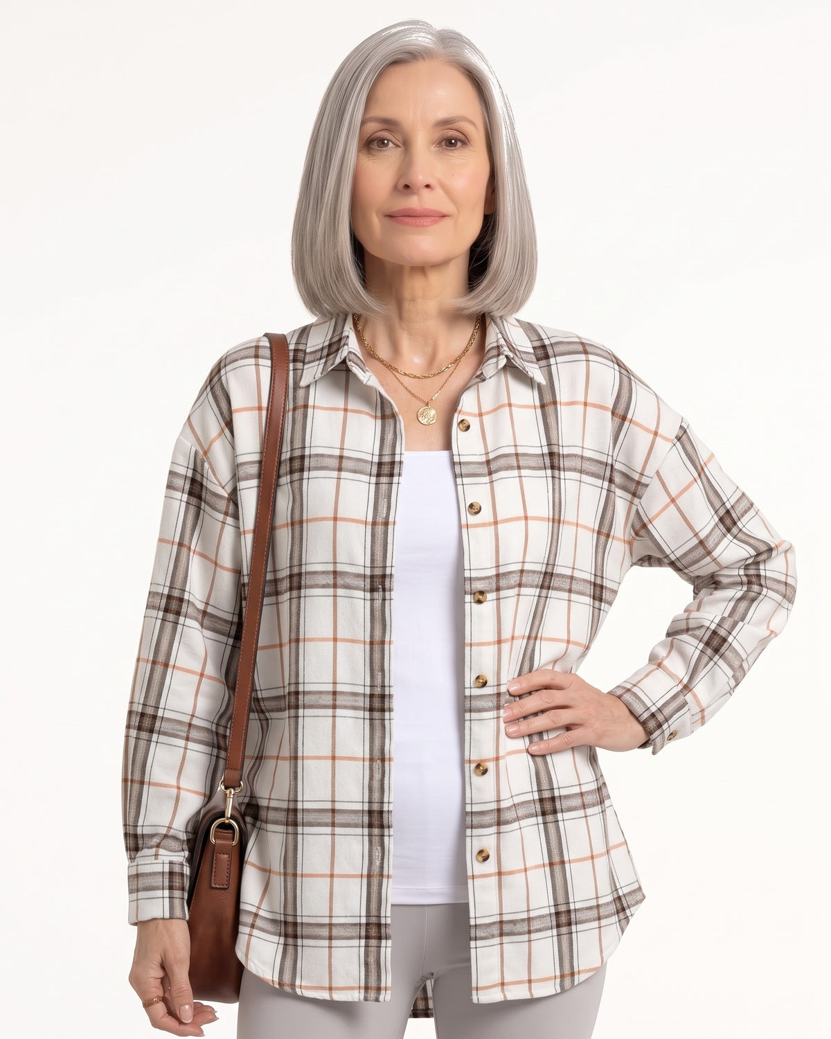 Beige and brown plaid oversized button-down shirt with long sleeves and front buttons