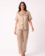 Beige satin pajama set with notch-collar short-sleeve button top and cropped pants
