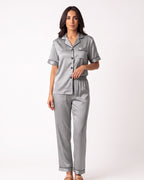 Gray satin pajama set with short-sleeve button top and ankle-length pants