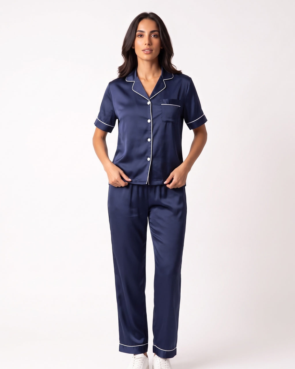 Navy satin pajama set with short-sleeve button top and ankle-length pants