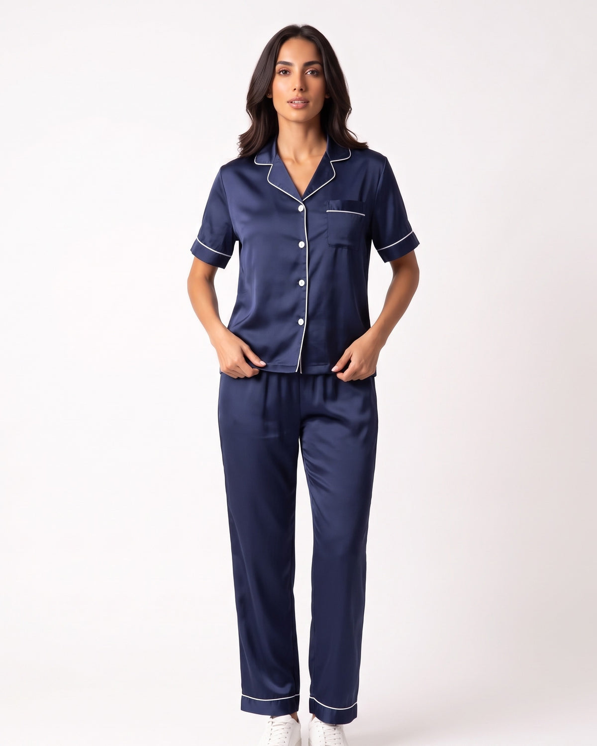 Navy satin pajama set with short-sleeve button top and ankle-length pants