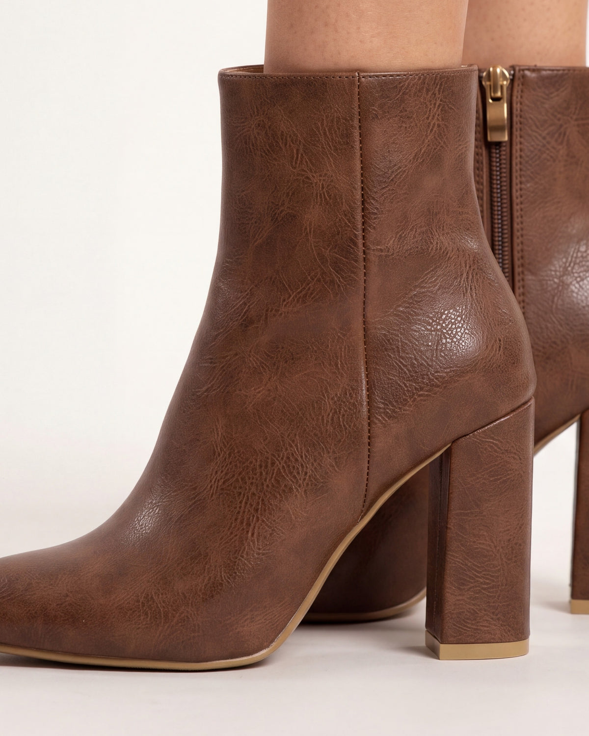 Pointed Toe Ankle Boots for Women — Block Heel Booties with Side Zip in Faux Leather in Brown — studio model photo [ai-studio]