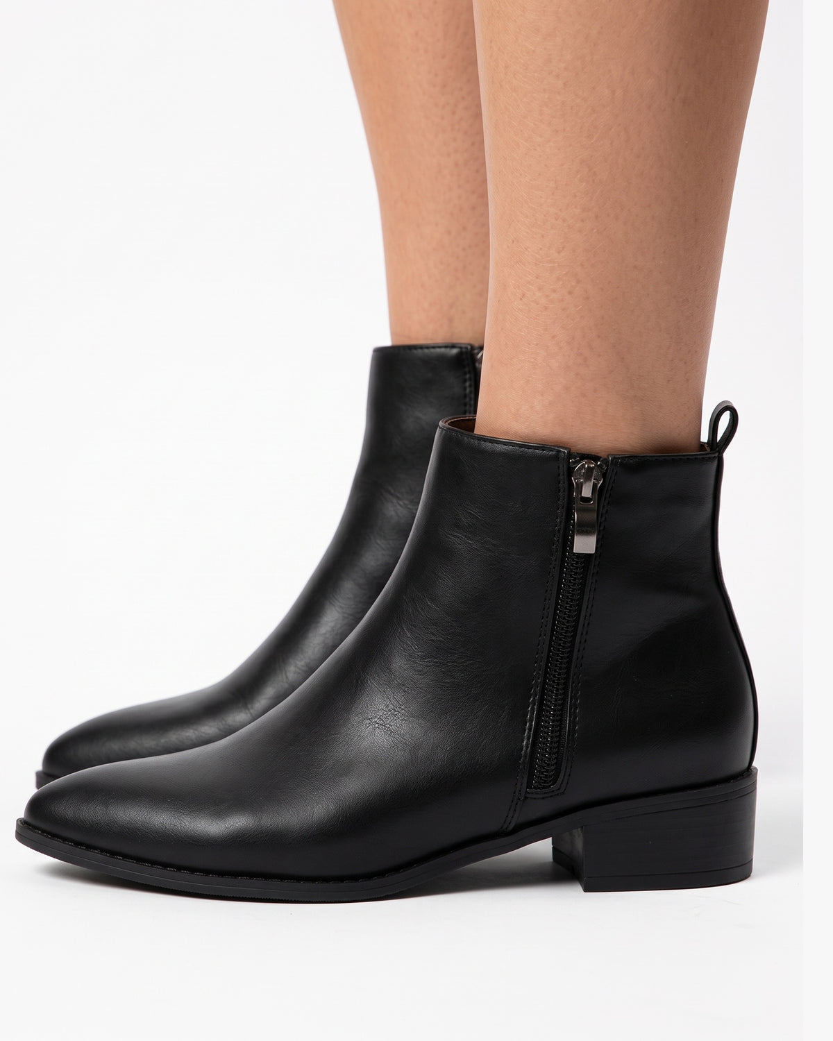 Black pointed-toe ankle booties with side zipper and low block heel