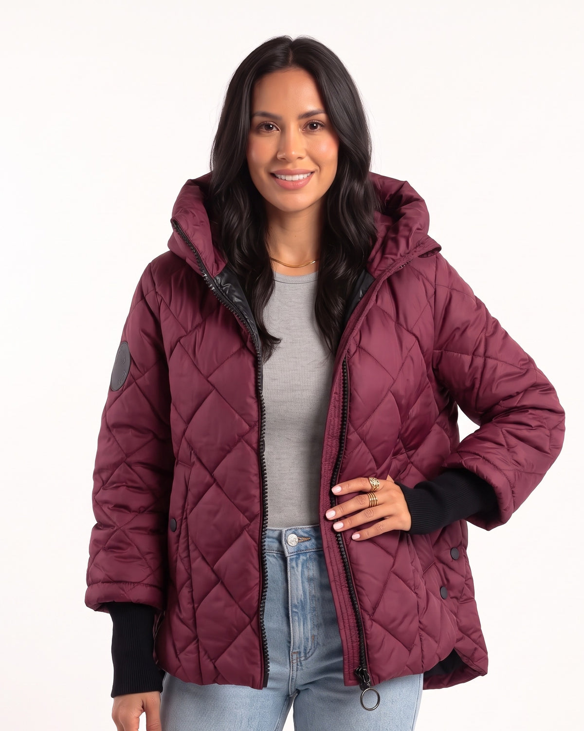 Burgundy quilted hooded puffer jacket with zip front and diamond stitching, snap pockets