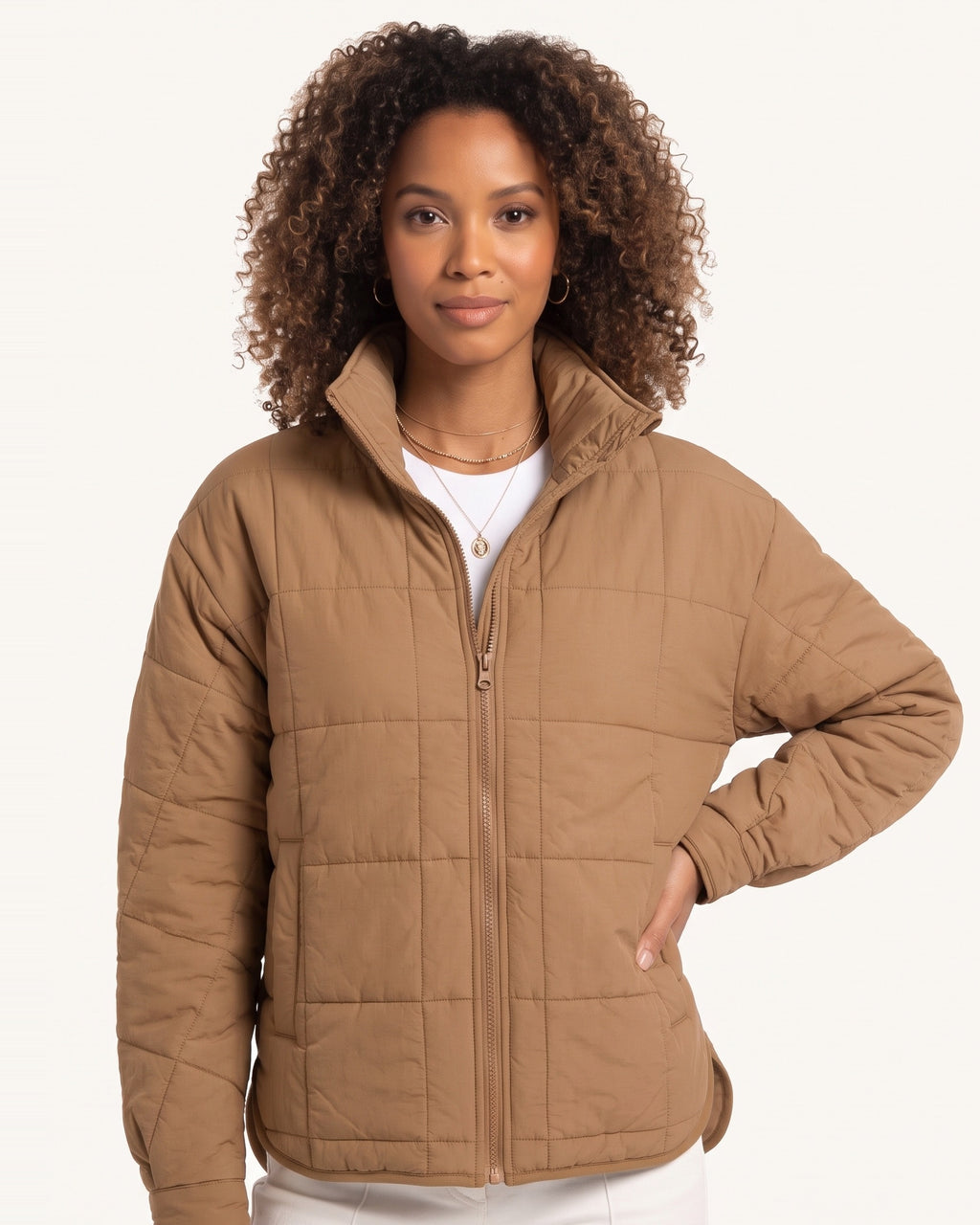 Tan lightweight quilted puffer jacket with stand collar and full-zip